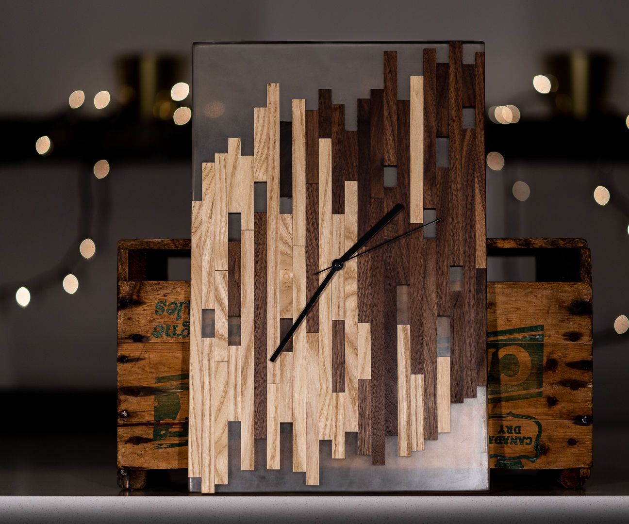 Finished walnut and ash mosaic wall clock set in clear epoxy